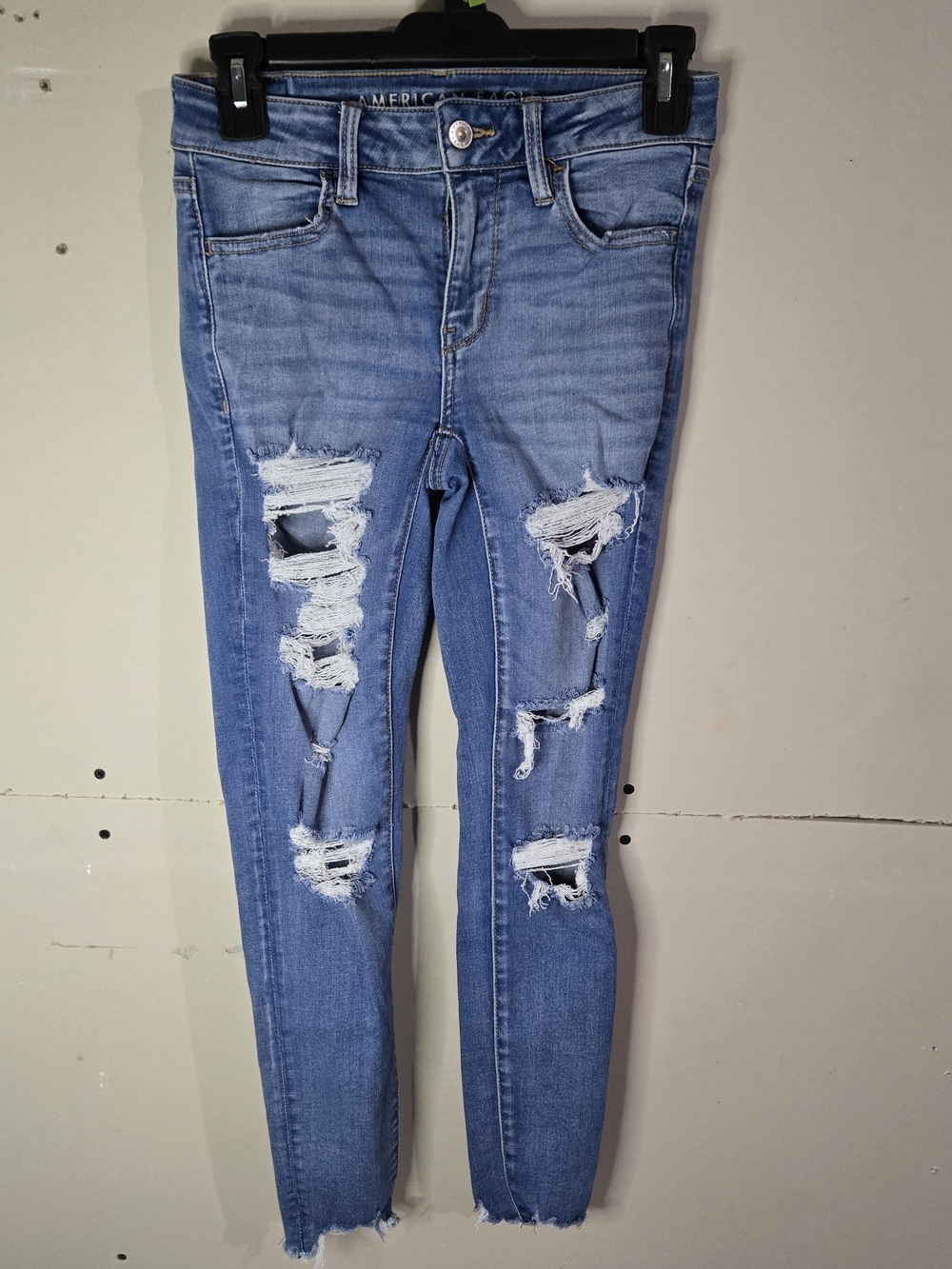 American Eagle Outfitters Light Blue Ripped Skinny Jeggings